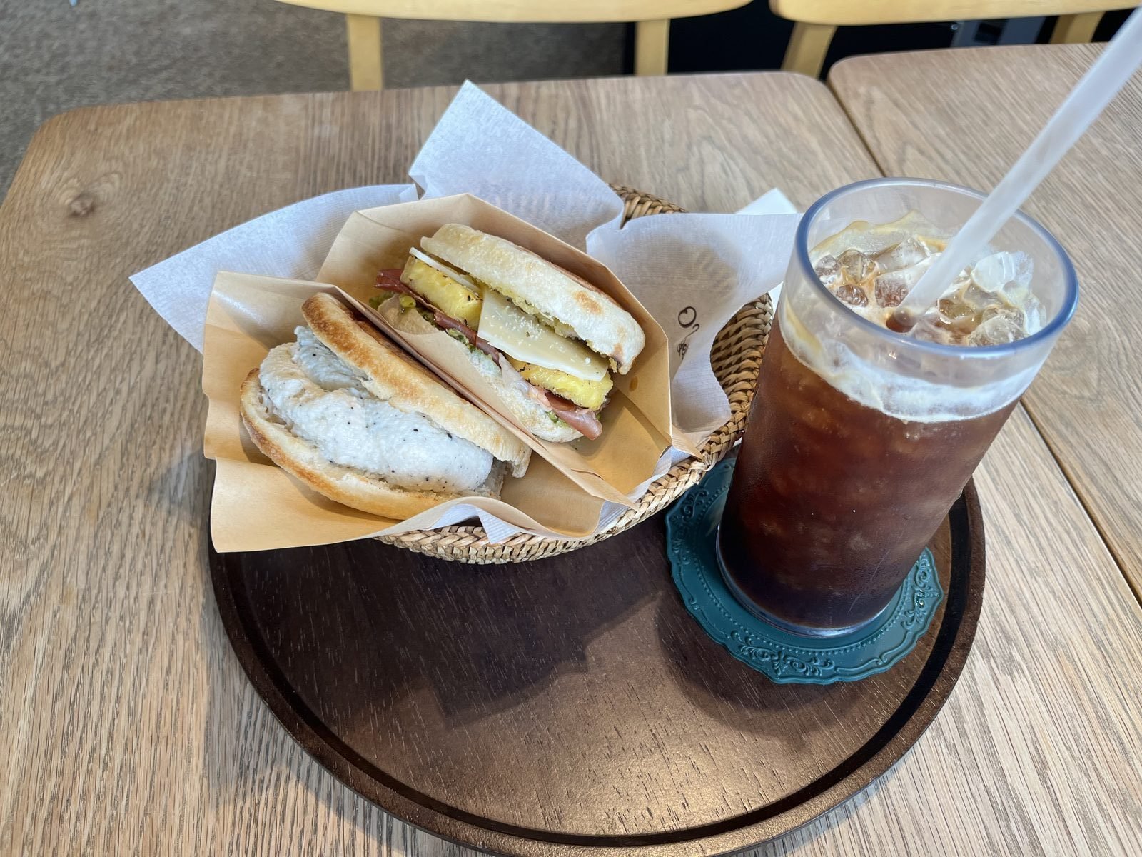 Set one at O Tigelle: a truffle ricotta tigella and a special in a basket, with iced coffee