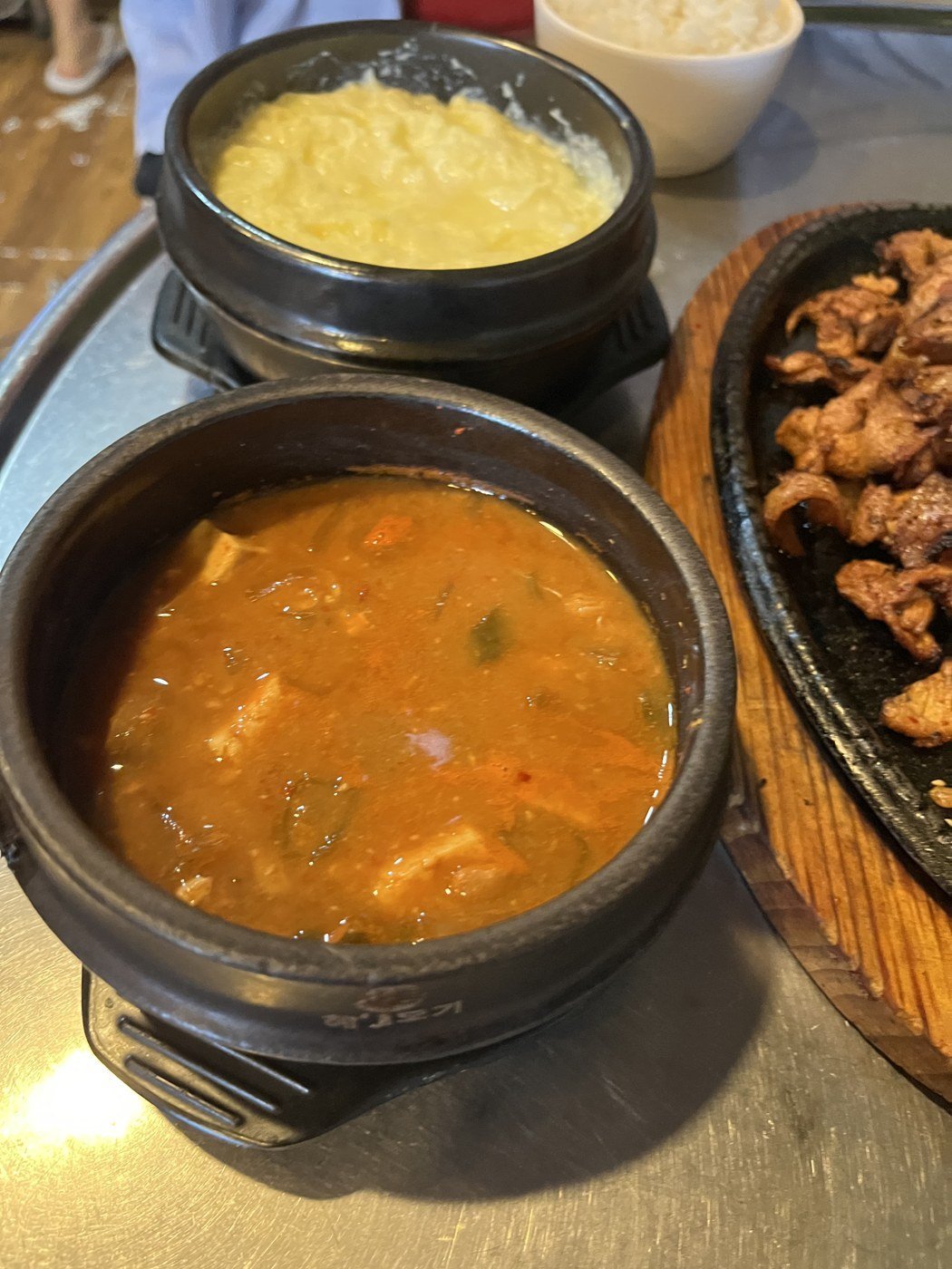 Steamed egg at the back, cheonggukjang in front.