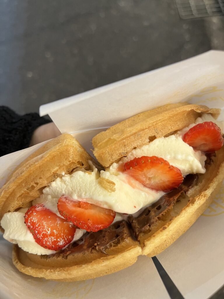 Strawberry Nutella gelato waffle from Waffle University, cut in half